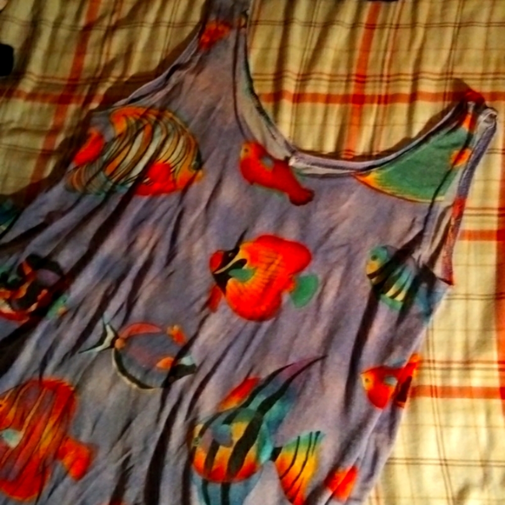 Dress size large and colors are blue orange greenish grayish purplish